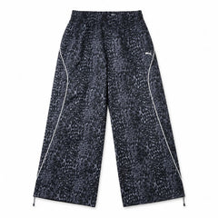 Puma Sport — Pantalone Relaxed Animal Printed Wide 694005